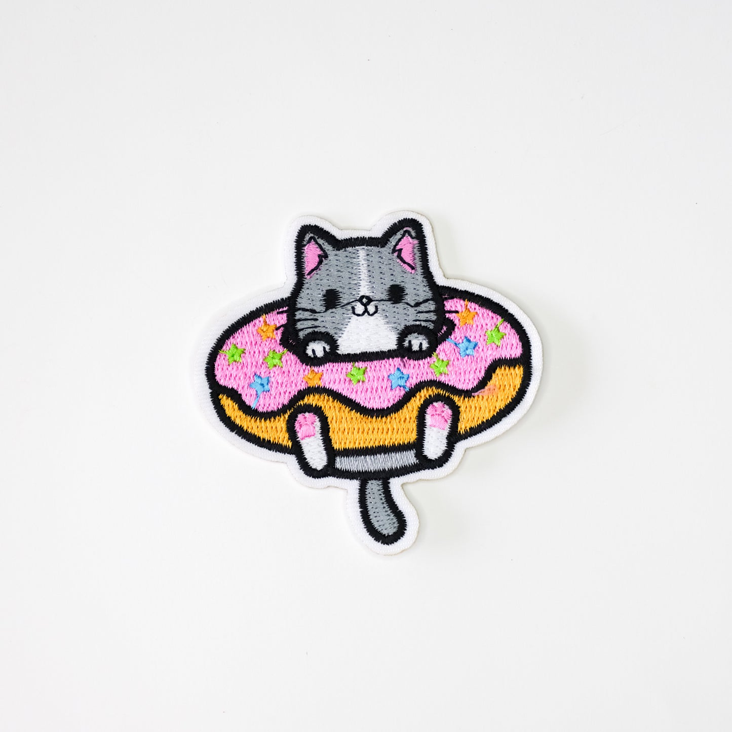 Cat in a Donut
