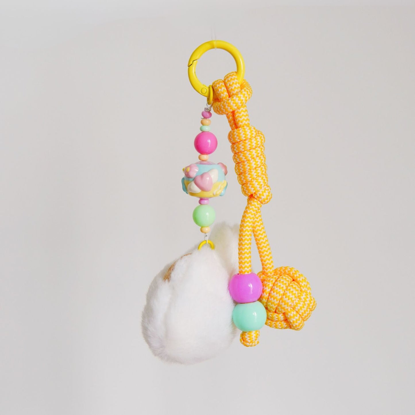 White Kitty Yellow Squeaky Charm